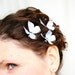 three handmade sky-blue pure silk butterfly hair clips . early morning musings