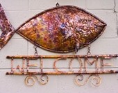 Copper Fish Welcome sign
