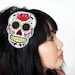 Sugar skull headband Dia de los muertos, in white with red rhinestones