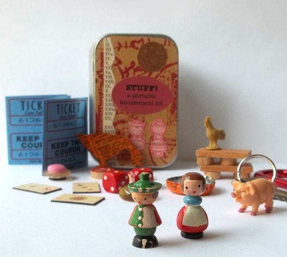Toy set in a tin, pocket size amusement kit for kids, with vintage Sevi figures, wooden game pieces, and other random items