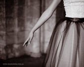 Classic black and ivory tulle tutu skirt for women. Lined in ivory satin in tea length.