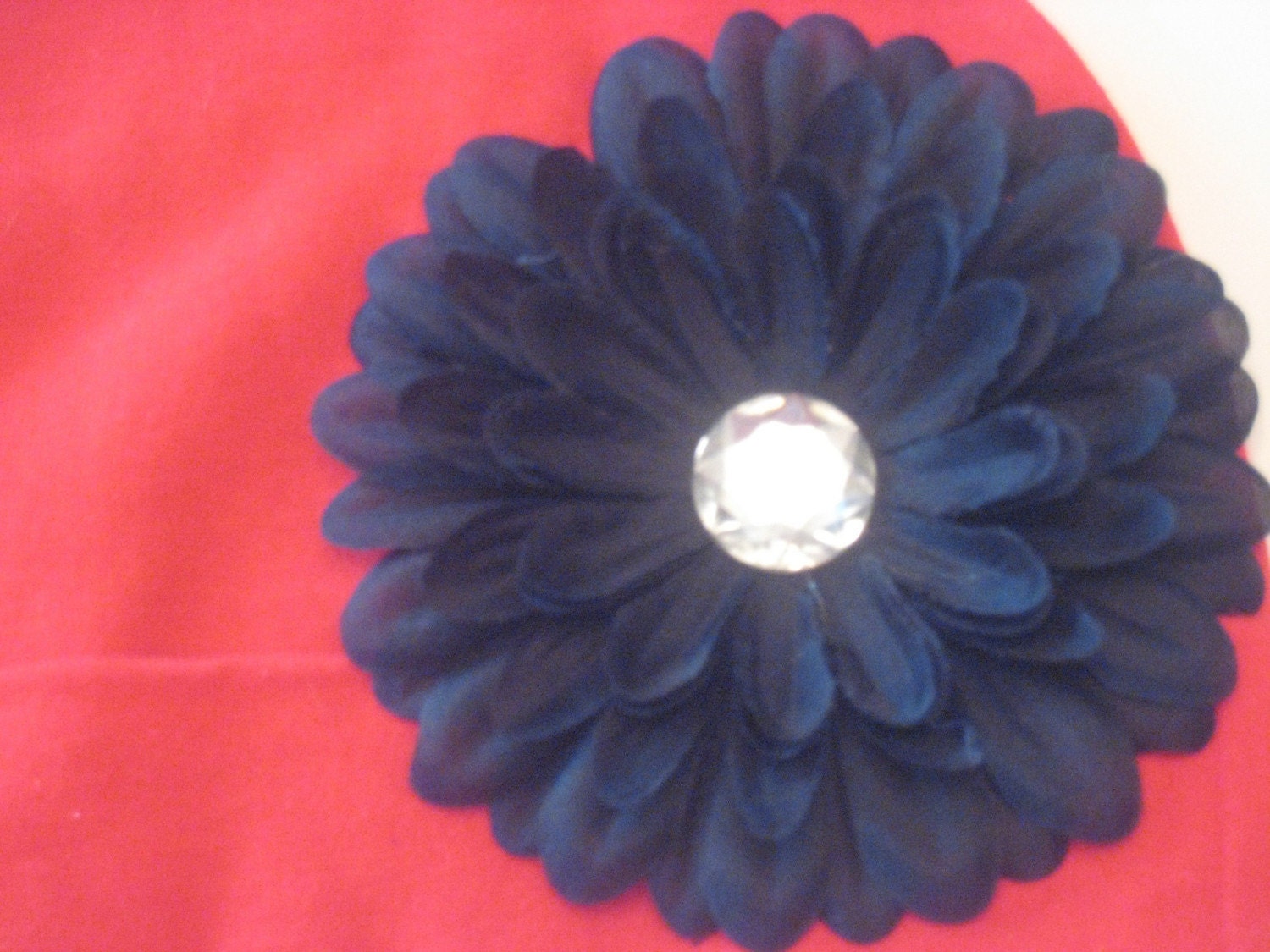 Husker Soft and Sassy Red Cotton Infant Hat with Adorable Black Flower