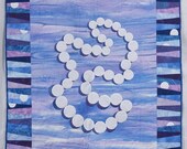 Quilted Wall Hanging -- White Pearls Shadowed against Blue and Purple
