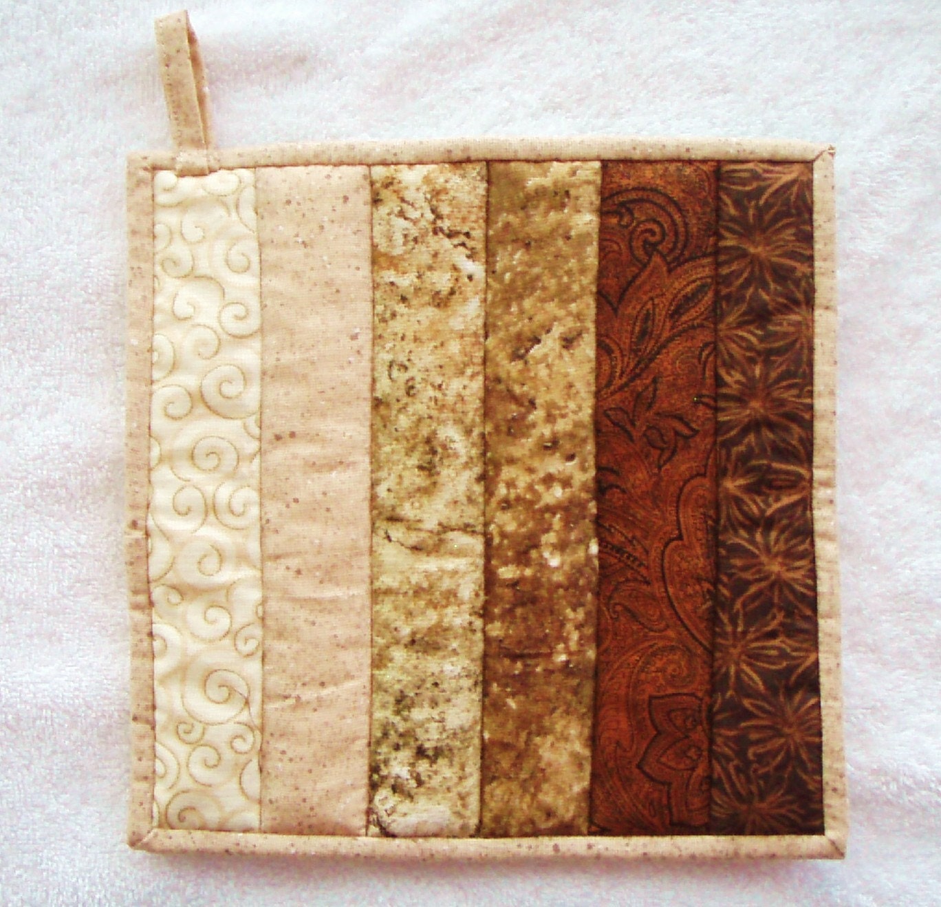 Quilted Potholder  / Hotpad -- Ombre Sand Colored Colorwash in Shades from Ecru to Dark Brown with Brown Tropical Backing