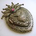 ANTIQUED Mexican SACRED HEART Locket Pendant with Sacred Heart Milagro and Fuchsia Swarovski Crystal