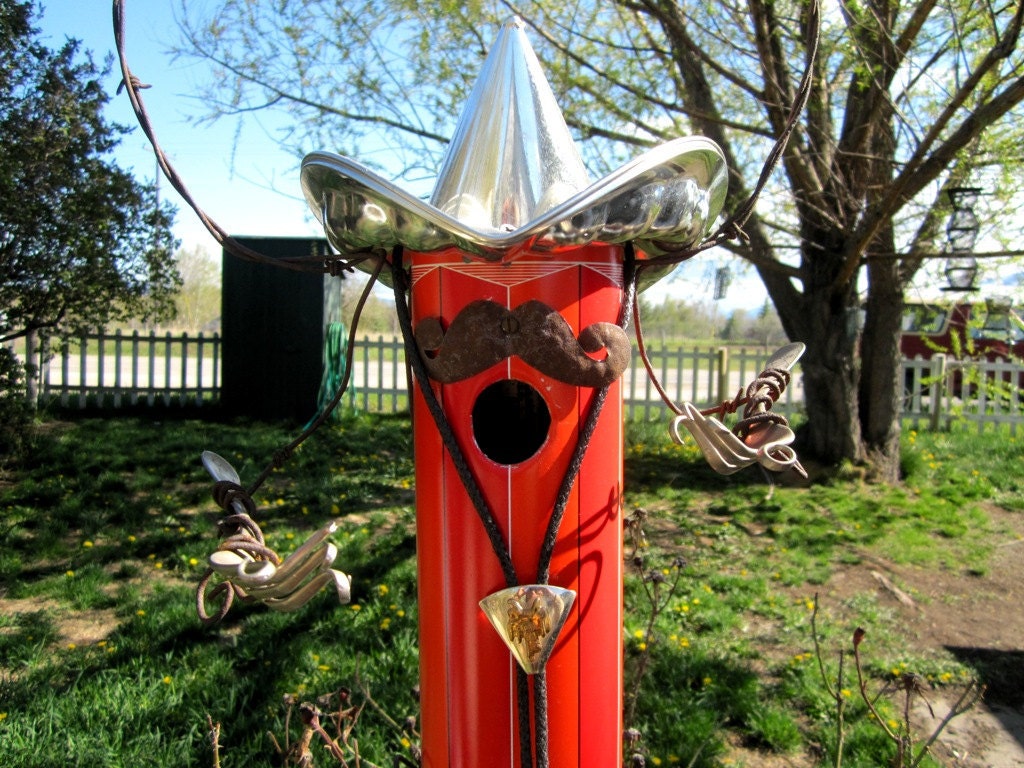 Odd Singing Cowboy Birdhouse With Forks and Bolo Tie