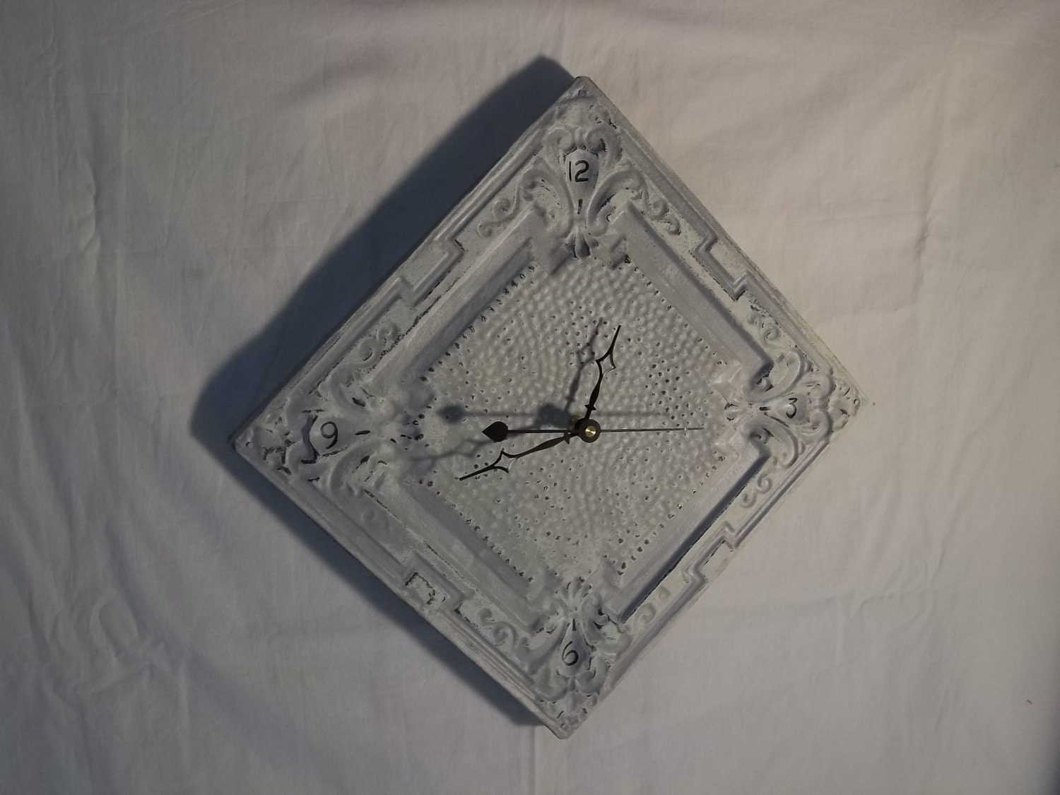 Weathered Gray Wall Clock in old ceiling tin