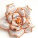 Newspaper and Crab Hair Flower with Glass Bead Fascinator