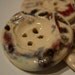 Red and white ceramic buttons