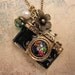 Take a picture. a vintage camera necklace adorned with  pearl and crystal bead