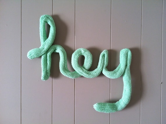 Knitted sign