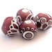BINDU- 4 Round Lampwork bead / pendant in purple