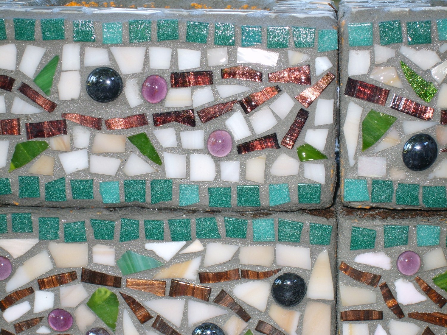 Upcycled mosaic herb garden planter with olive branch pattern