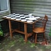 Kitchen Table Maurice de Sully: Puzzle Table, reclaimed oak, milk paint checkerboard.