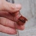 Book Necklace: Small, brown with tie.