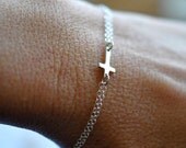 Tiny cross bracelet in Sterling silver