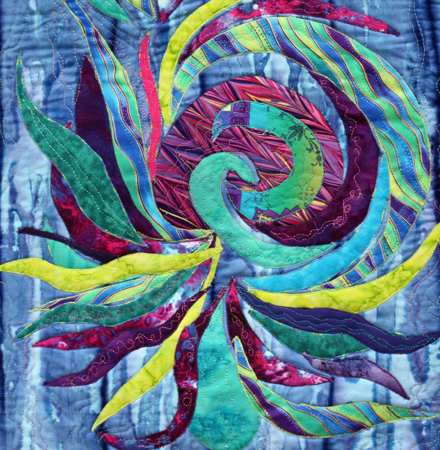 abstract art quilt  sprial  in blue teal purple and green