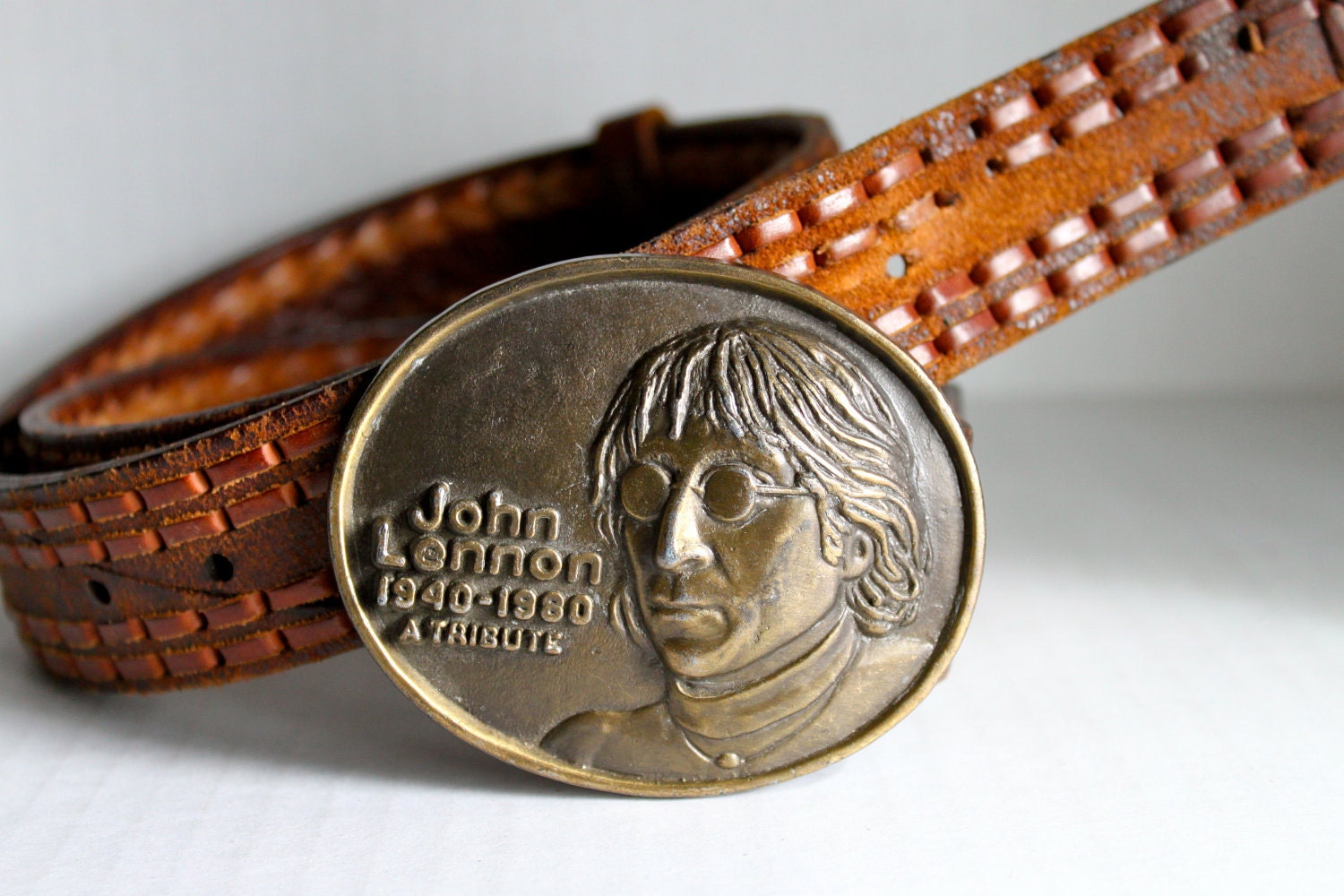 vintage 80s JOHN LENNON memorial belt buckle on a brown belt // 36