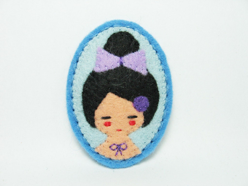 A Japanese girl with a tattoo felt pin