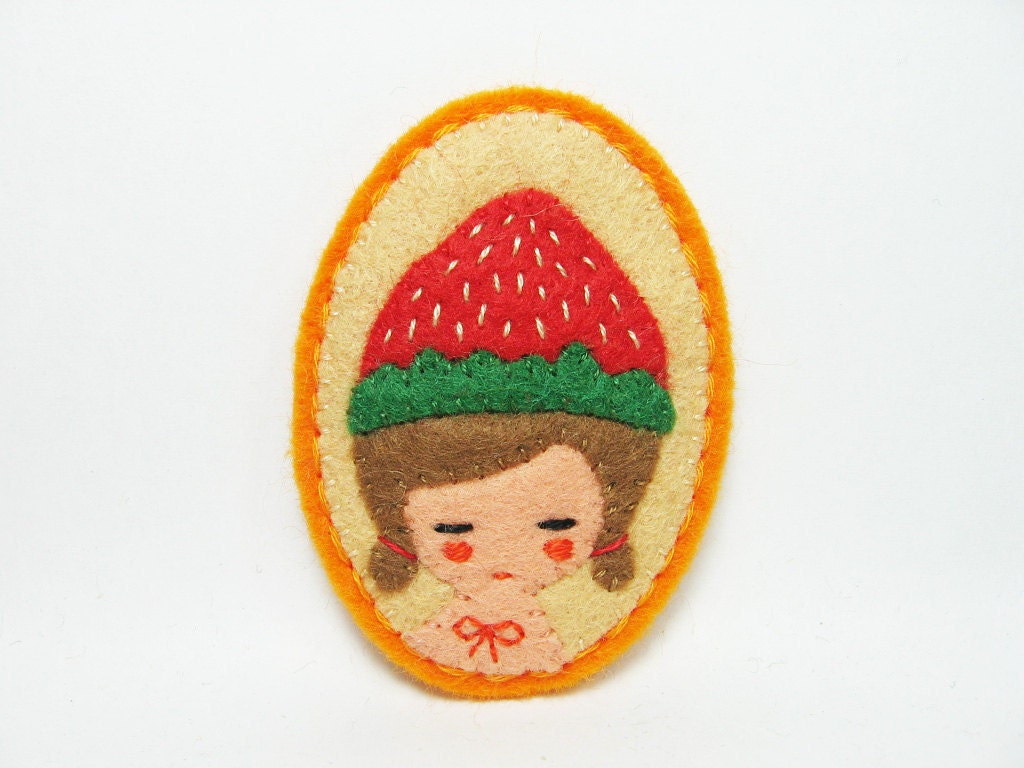 A Girl with a Strawberry hat felt pin