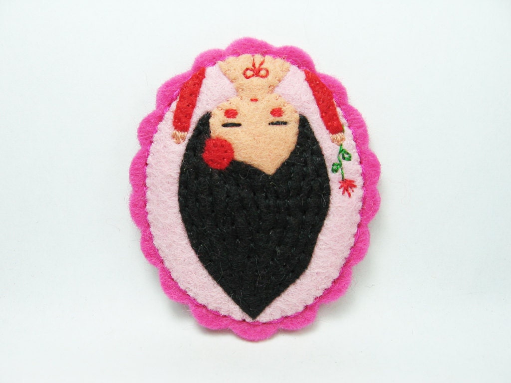 Stills from a roller coaster felt pin