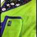 Lime green and dark purple hooded towel with embellished hood