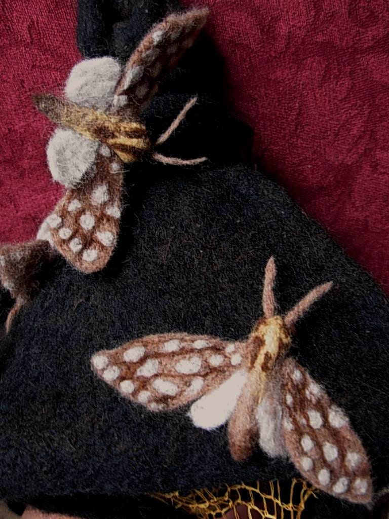 MOTH LAMP HAT -- Needle Felted Wool with golden crochetted light panels that moths are swarming around.