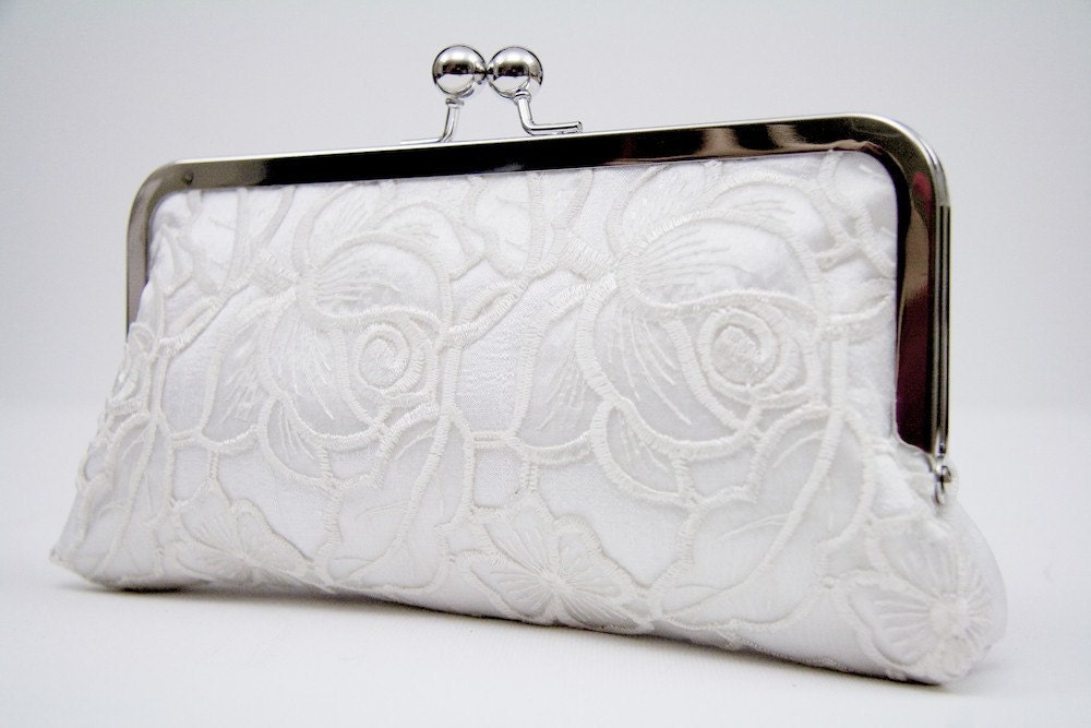 Bride's white lace clutch bag