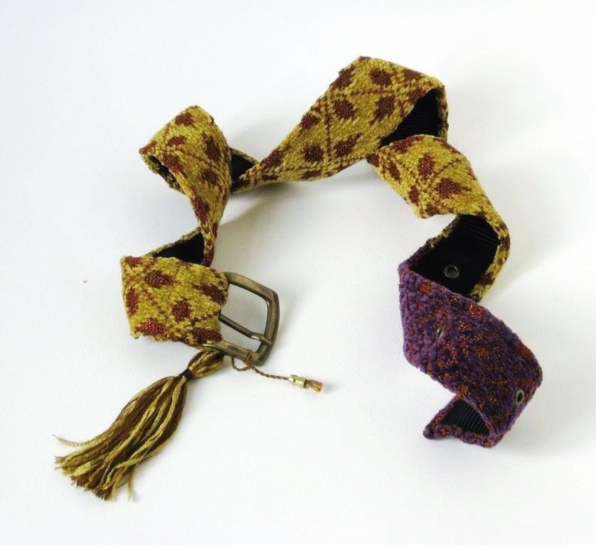Tribal knitted belt of bronze cotton, yellow and purple velvet and bronze metal yarn JALA.