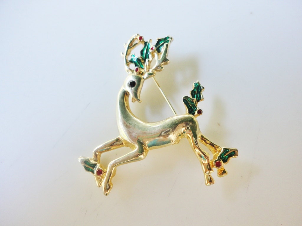 vintage Christmas raindeer brooch goldtone and rhinestone eye