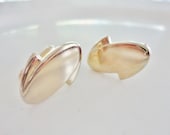 vintage jewelry for man goldtone oval shaped set of cuff links signed SWANK
