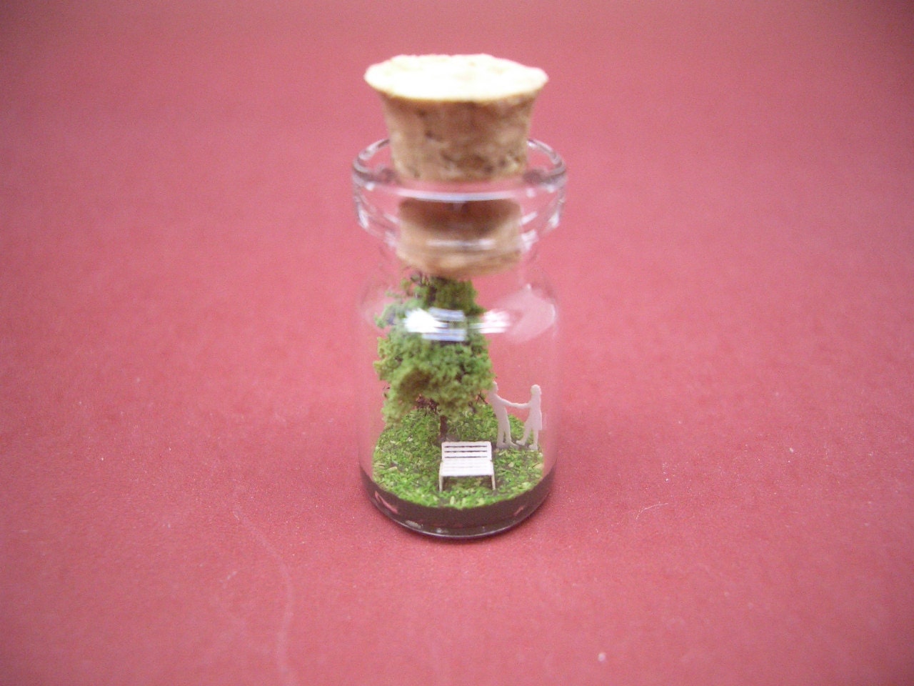 Tiny green tree and a couple in a tiny bottle ver.4
