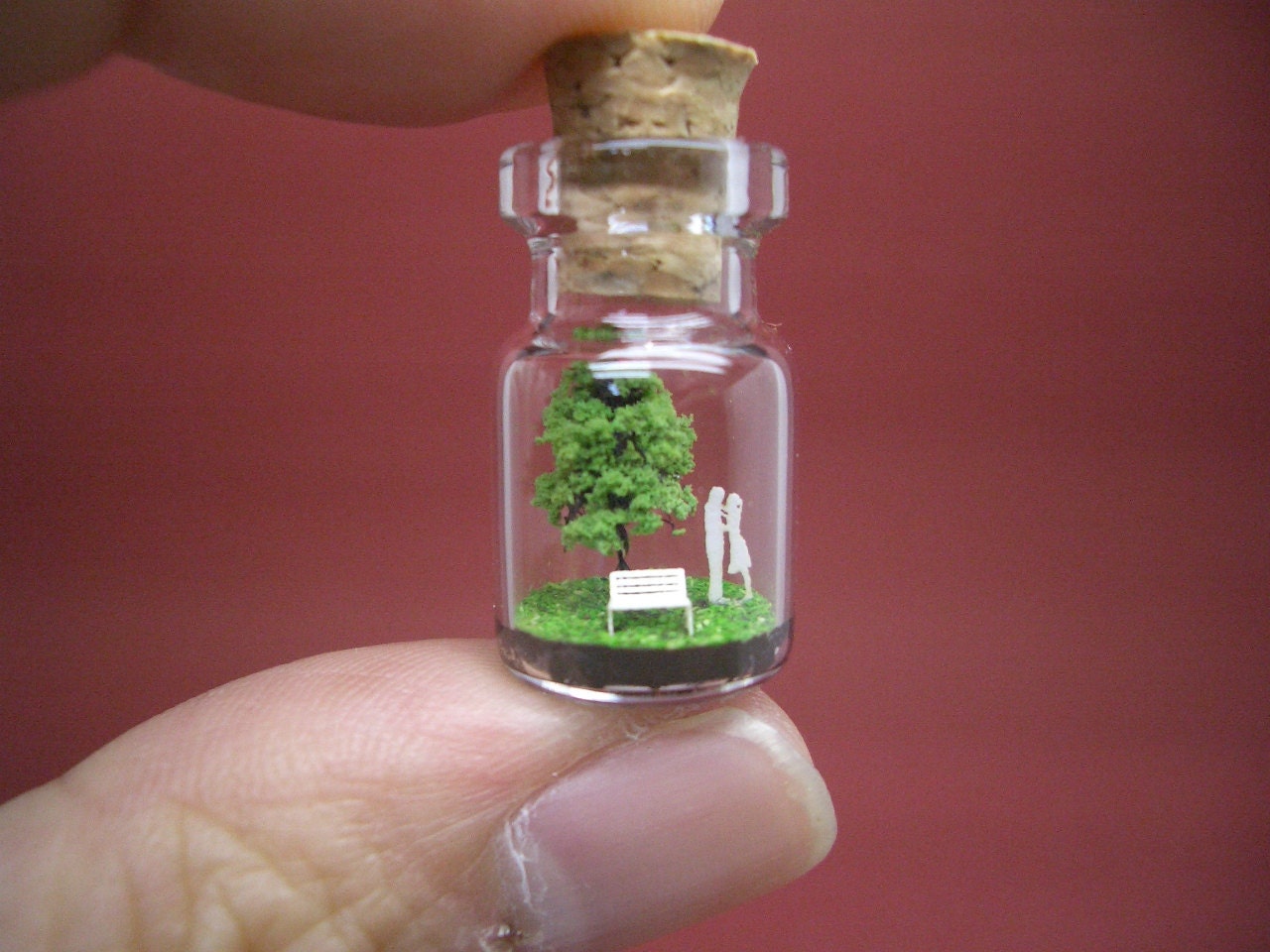 Tiny green tree and a couple in a tiny bottle ver.3