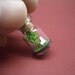 Tiny green tree and a couple in a tiny bottle ver.2