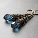 Montana Blue Crystal Teardrop Earrings with Fancy Antique Brass Filigree Cone Cap