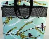 Large Purple Bird on a Flowering Limb Mesh Tote Bag
