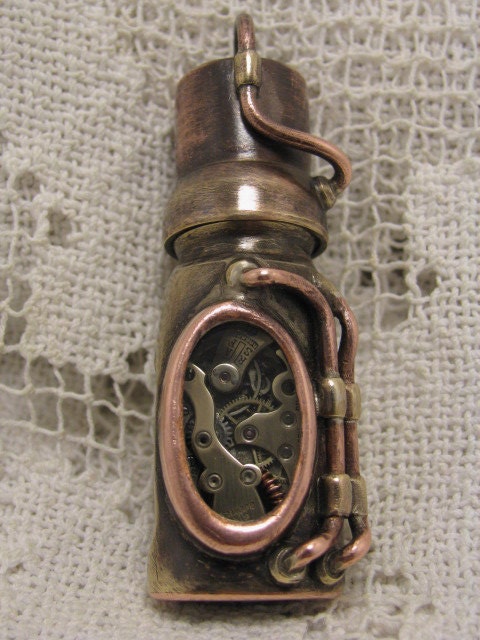 Steampunk USB flash drive with glowing glass windows. 16 GIG. Copper, brass, watch parts and glass. Waterproof.