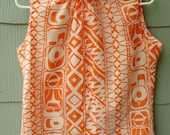 Mid-Century High-Neck Sleeveless top and Skirt Set. Orange and White Geometric Print. Medium