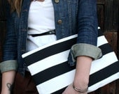 Oversized Black and white striped zippered clutch.