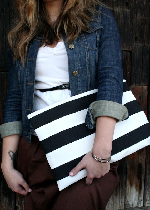 Oversized Black and white striped zippered clutch.
