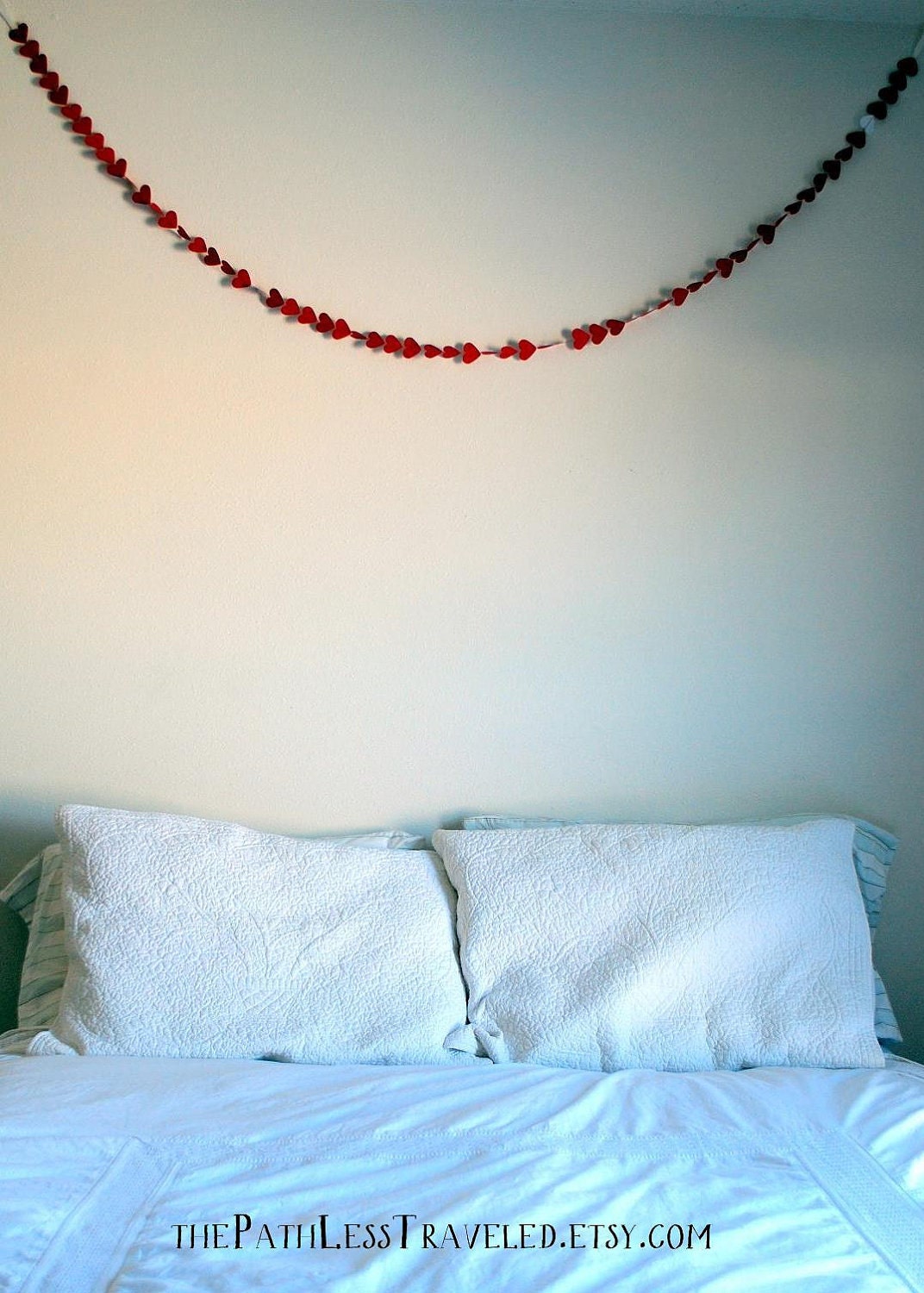 Romantic Paper Hearts Garland - red with a single white heart, 10'