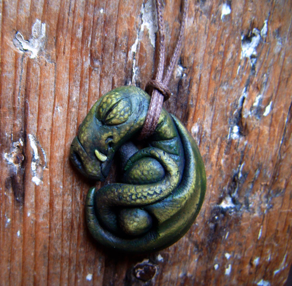 Sleeping dragon pendant
