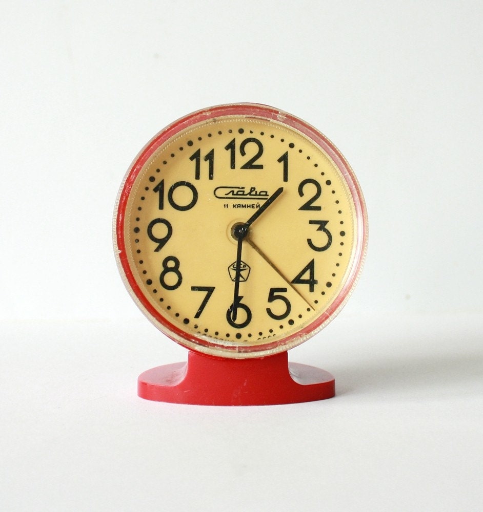 Vintage Russian mechanical alarm clock Slava from Soviet Union period
