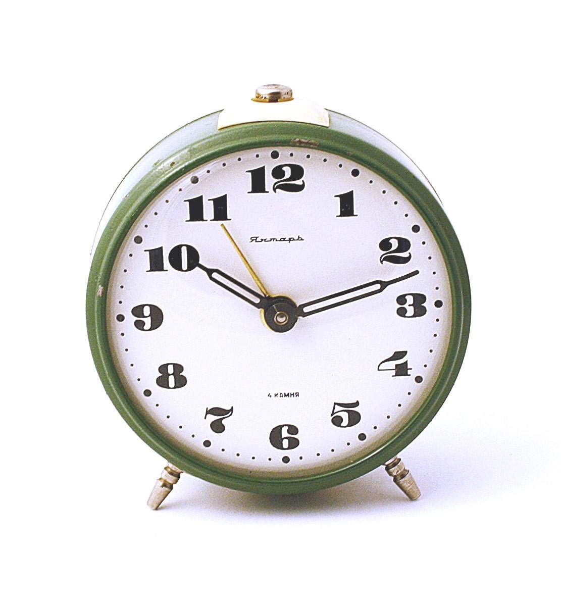 Vintage alarm clock Jantar from Soviet Union era green color clock