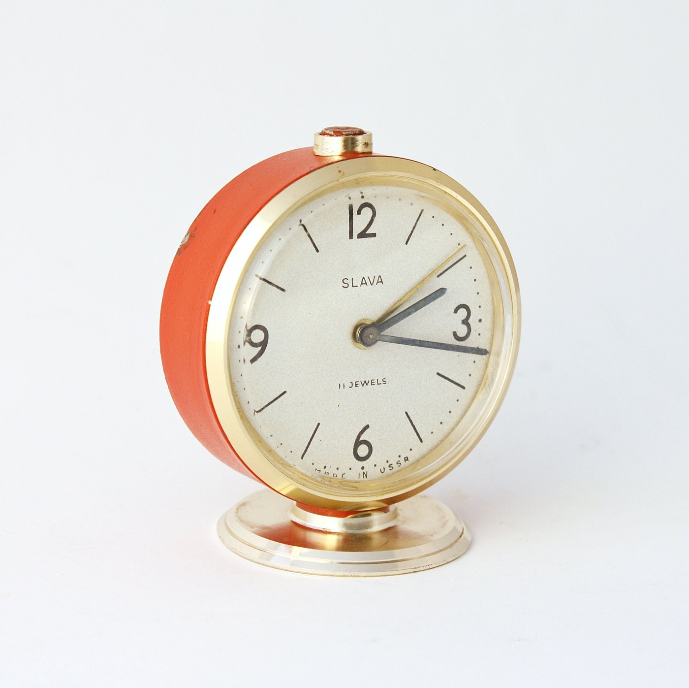 Vintage Russian mechanical alarm clock Slava from Soviet Union period red alarm clock