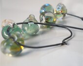 Earrings of Green Glass Watery Drops and Oxidized Sterling Silver