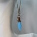 TURQUOISE Blue  Faceted Marquise Glass and Copper Wire Wrapped Earrings.