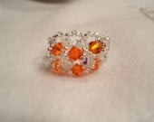 Red topaz swarovski crystals ring with daisy spacer
