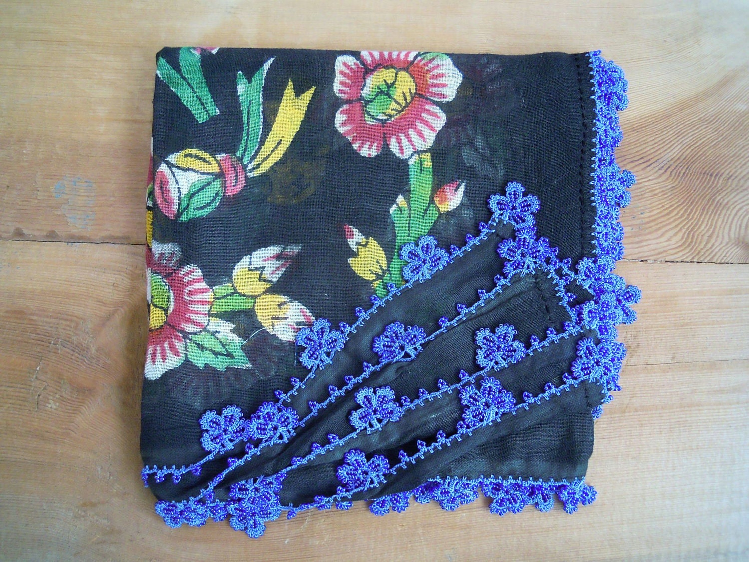 black floral scarf with blue beaded edging