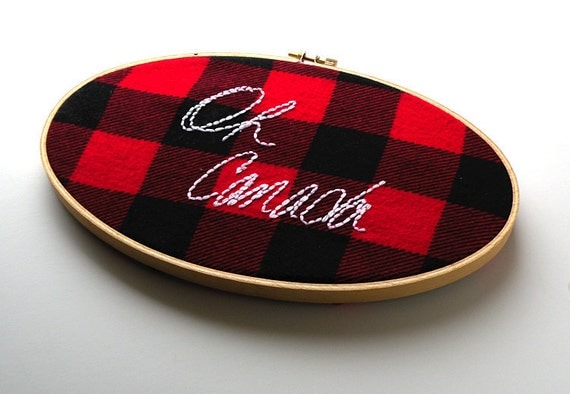 Oh Canada embroidered red and black flannel wooden hoop wall hanging 5x9 oval